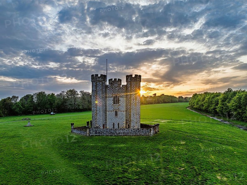 Sunset over Hiorne's Tower from a drone, Arundel, West Sussex, England, United Kingdom