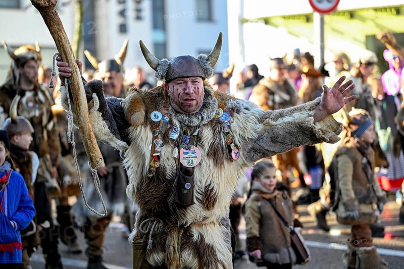Member of a fools' guild in traditional Haes, fools' clothes, during the carnival procession in Achern, Ortenaukreis, Baden-Württemberg, Germany