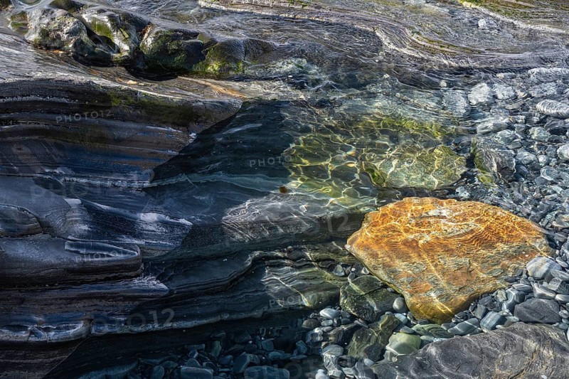 Rocks and stones in the Barents Sea, Söröya, Finnmark, Norway, May 2019