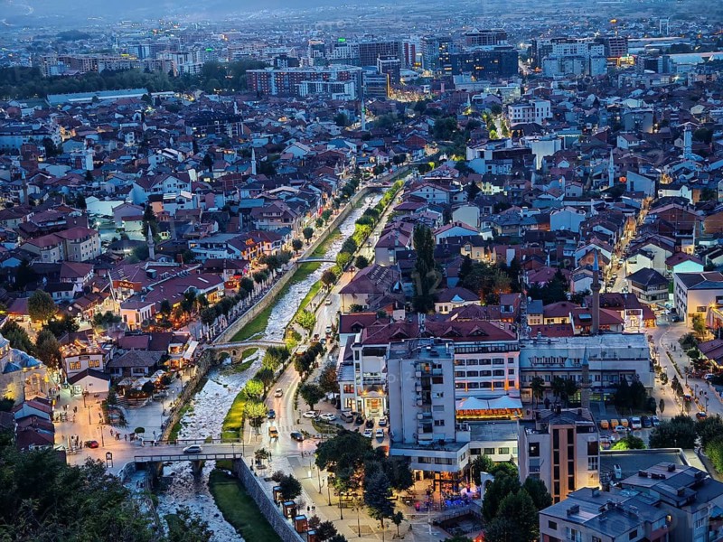 View of Prizren from above, Illuminated cityscape at night with a river, roads and bridges, Prizren, Kosovo