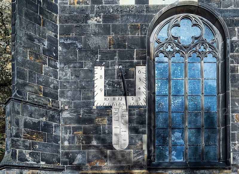 Sundial and church window of the Grote Kerk, originally Middle Ages, fundamentally changed in the 19th century, Enschede, the Netherlands