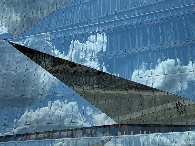 The 'cube Berlin' is a spectacular, cube-shaped office building on Washingtonplatz, right next to Berlin Central Station. It was completed in February 2020 and is considered one of the most innovative and smart buildings in Europe. The glass façade reflects the surroundings in a kaleidoscopic and cubist way. architecture, cubism, cube, reflection, innovation, landmark. Designed by renowned Danish architecture firm 3XN Architects. Washingtonplatz 3, 10557 Berlin, Mitte district, directly at the main train station, Germany