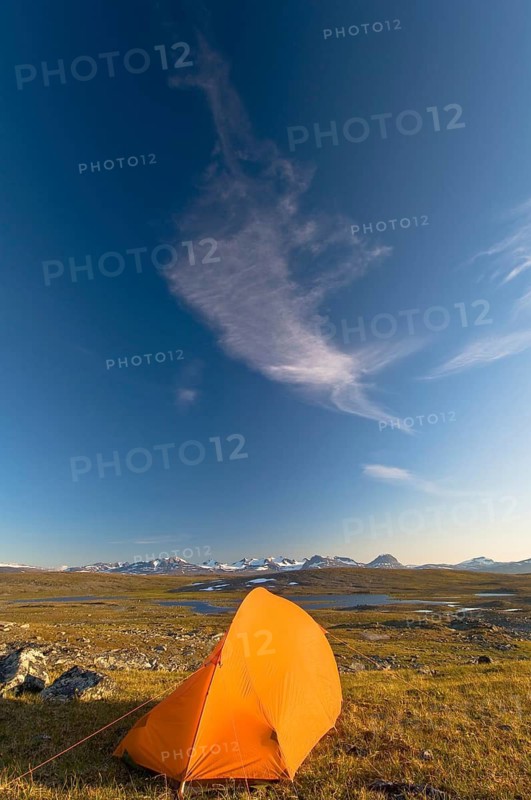 Tent in Stora Sjöfallet National Park, Laponia World Heritage Site, the Akka Massif on the horizon, Lapland, Sweden bivouac