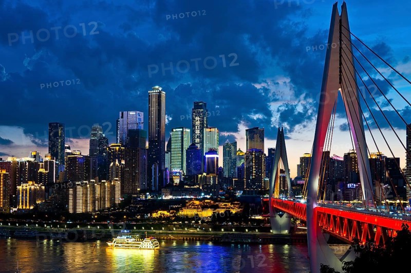 Evening, twilight, Dongshuimen Bridge across the Yangtze River in front of skyscrapers, skyline, Chongqing, China