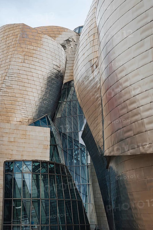 Exterior view of the Guggenheim Museum with titanium plates and glass elements in Bilbao, Spain