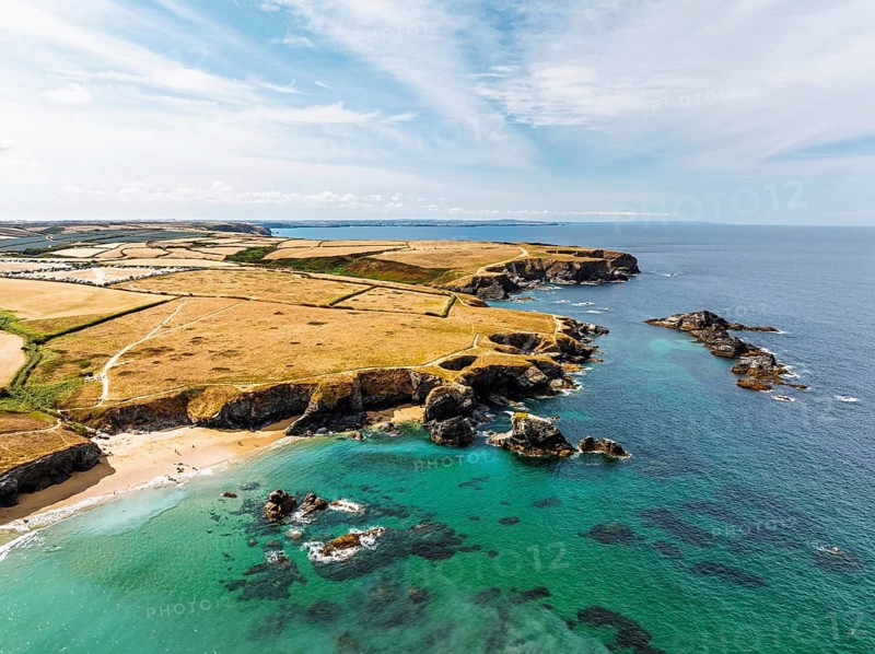 Farms and Fields over Cliffs and Porthcothan Bay from a drone, Porthcothan, Padstow, Cornwall, England, United Kingdom, Summer 2026