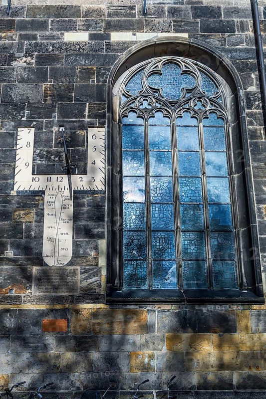 Sundial and church window of the Grote Kerk, originally Middle Ages, fundamentally changed in the 19th century, Enschede, the Netherlands