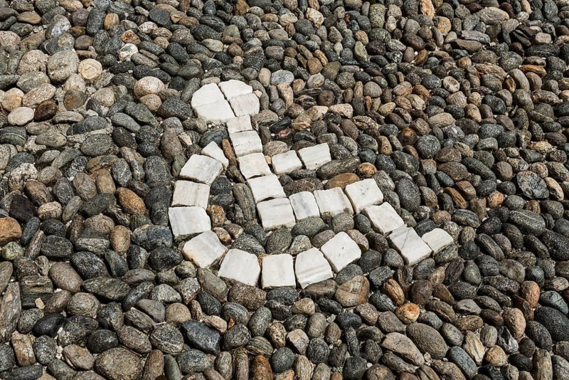 Pebble mosaic, wheelchair, disabled, parking lot, parking space for the disabled, Freiburg im Breisgau, Baden-Württemberg, Germany