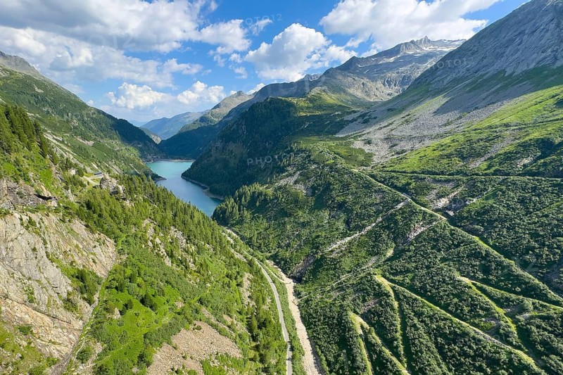 View from Kölnbrein Reservoir to Galgenbichl Speicher, Vorspeicher Galgenbichl Reservoir Interim Storage Facility, part of Pumped Storage Power Plant Malta-Oberstufe Main Stage of Pumped Storage Power Station Malta, right footpath from dam down into the Malta Valley, Hohe Tauern, Carinthia, Austria
