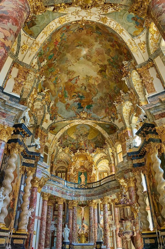 Magnificent baroque hall with gilded decorations and ornate frescoes on the ceiling, Hofkirche, Würzburg Residence, Würzburg, Bavaria, Germany