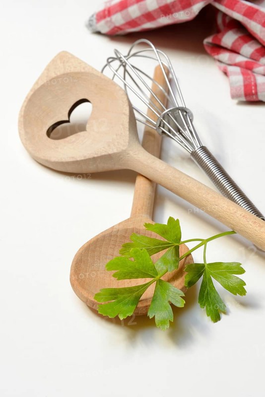 Cooking spoon and parsley, herb, Petroselinum crispum