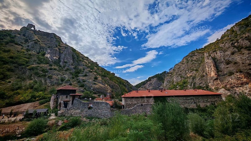 Historic Orthodox monastery building, Archangel Monastery, Manastir Sveti Arhandeli, in a natural mountainous environment surrounded by vegetation, Prizren, Kosovo