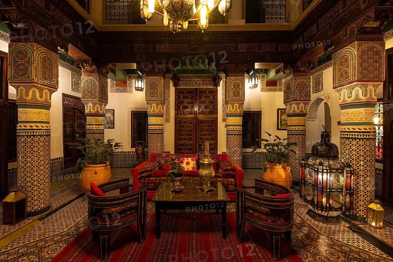 Oriental courtyard with carpet and beautiful furnishings at Hotel Riad Palais Sebhan, former city palace, Medina, Marrakech, Maghreb, North Africa, Morocco