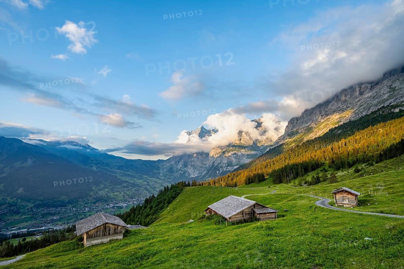 Alpine huts and alpine meadows, sunset, summit of the Wetterhorn in the background, Alpiglen, Grindelwald, Bernese Oberland, Switzerland
