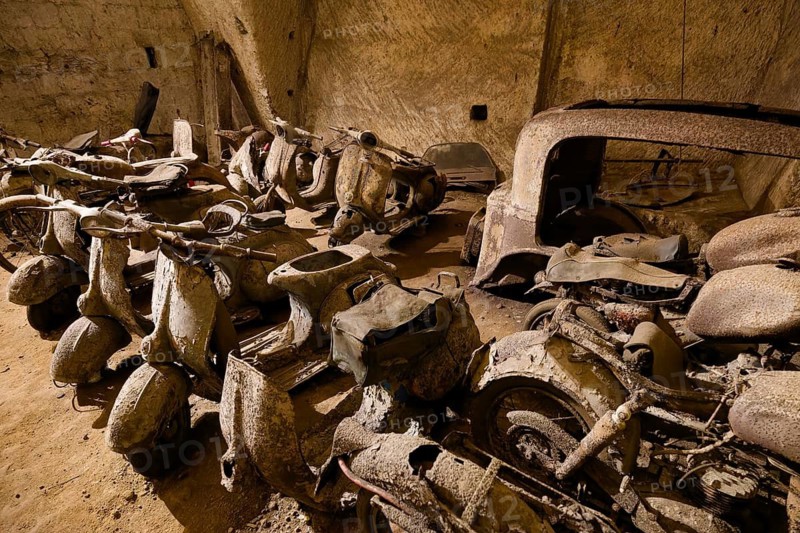 Rotten mopeds from the 1950s, Galleria Borbonica, Bourbon Tunnel, Naples underground, Campania province, Italy