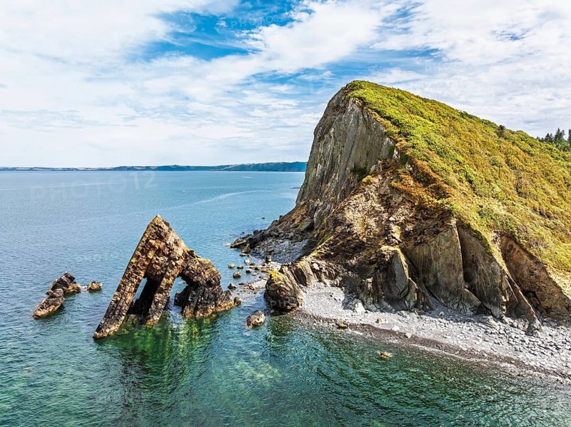 Blackchurch Rock and Cliffs over Mouthmill Beach from a drone, North Devon Coast, Devon, England, United Kingdom