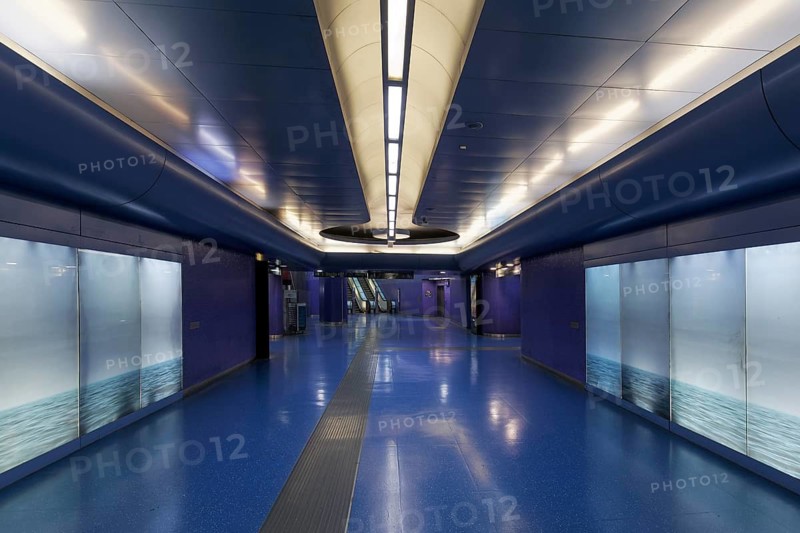 Passage in Toledo metro station, backlit wall with photo of the sea, architect Oscar Tusquets Blanca, art subway, Metrò dell' Arte, Naples, Campania, Italy