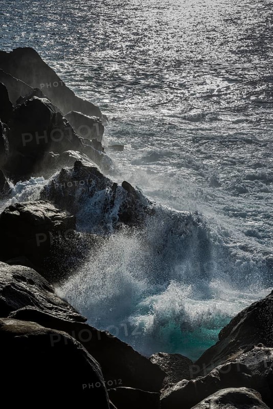 Thundering surf from the Atlantic Ocean on the rocky coast in San Sebastian, Basque Country, Spain