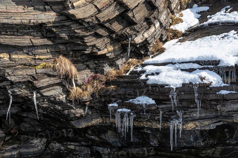 Icicles on rocks, Söröya, Finnmark, Norway, May 2019