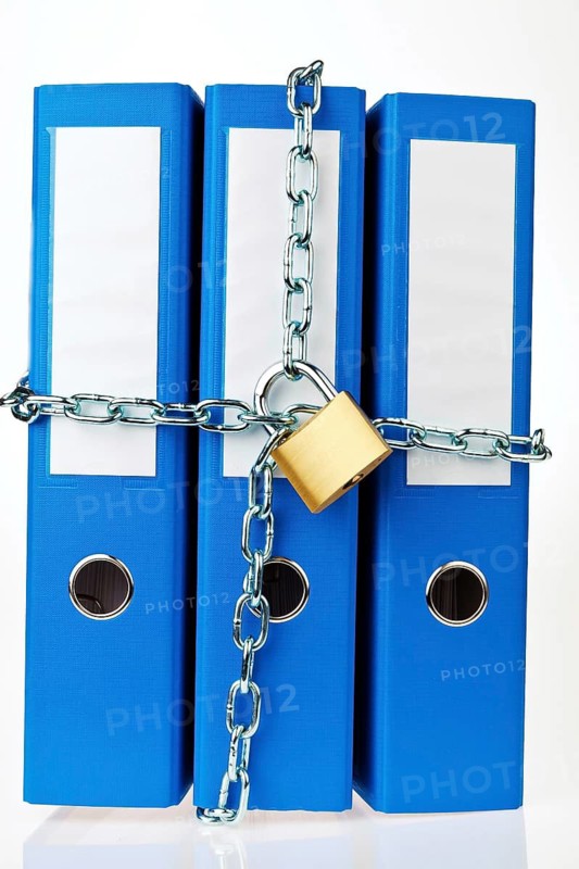 A file folder locked with a chain and padlock. Data Protection and Data Security, Austria