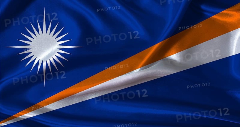 National flag of Marshall Islands with cloth texture. Marshall Islands flag with realistic texture background