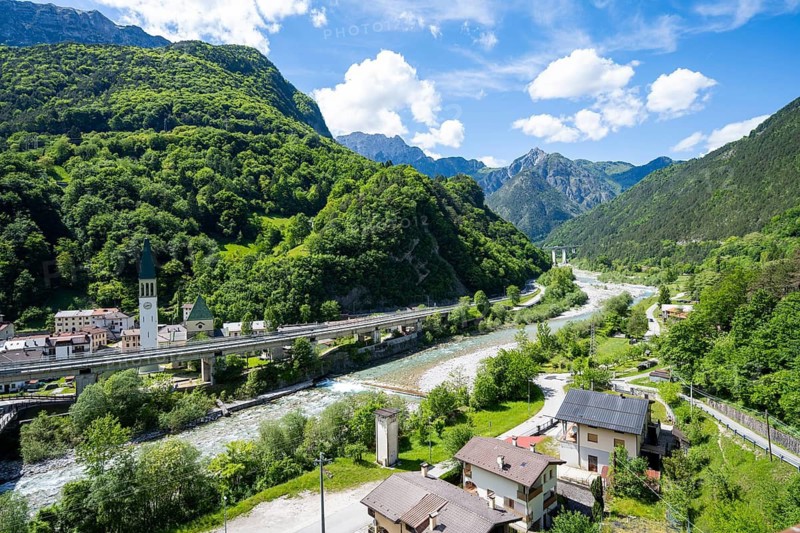 Mountain landscape and river La Fella in Eisental, town of Dogna with motorway, Julian Alps, Friuli-Venezia Giulia, Italy