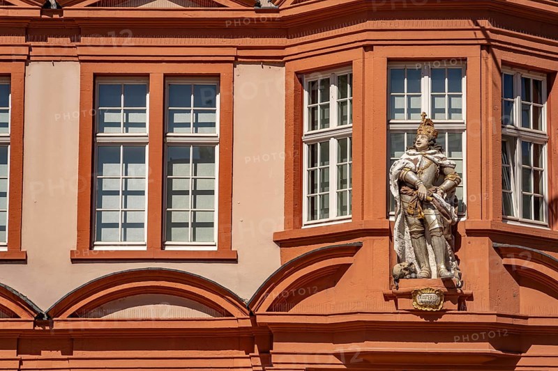 Figure of a Roman Emperor at the House of the Roman Emperor with Gutenberg Museum on Liebfrauenplatz in the old town of Mainz, Rhineland-Palatinate, Germany