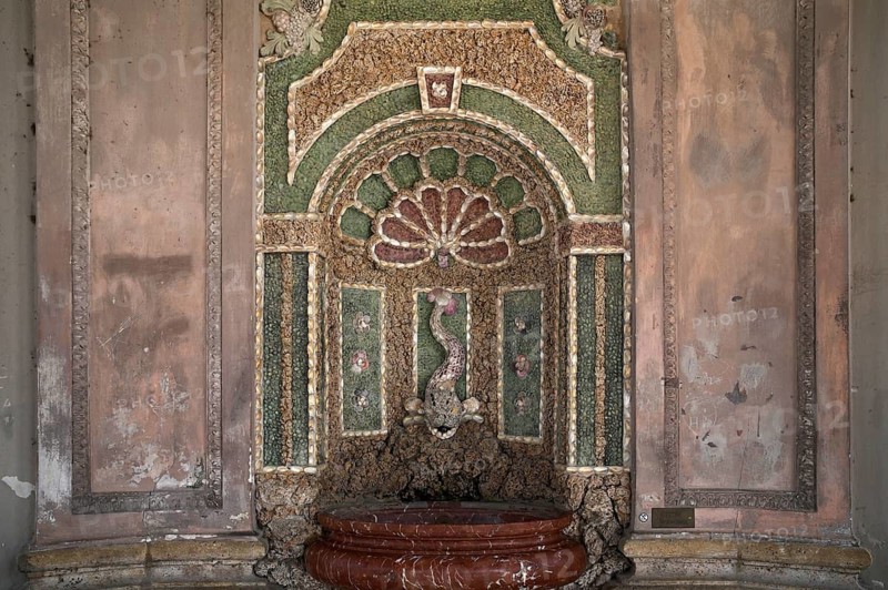 Fish from mussels as a water dispenser, fountain, mussel fountain in the Diana Temple, Hofgarten, Munich, Bavaria, Germany