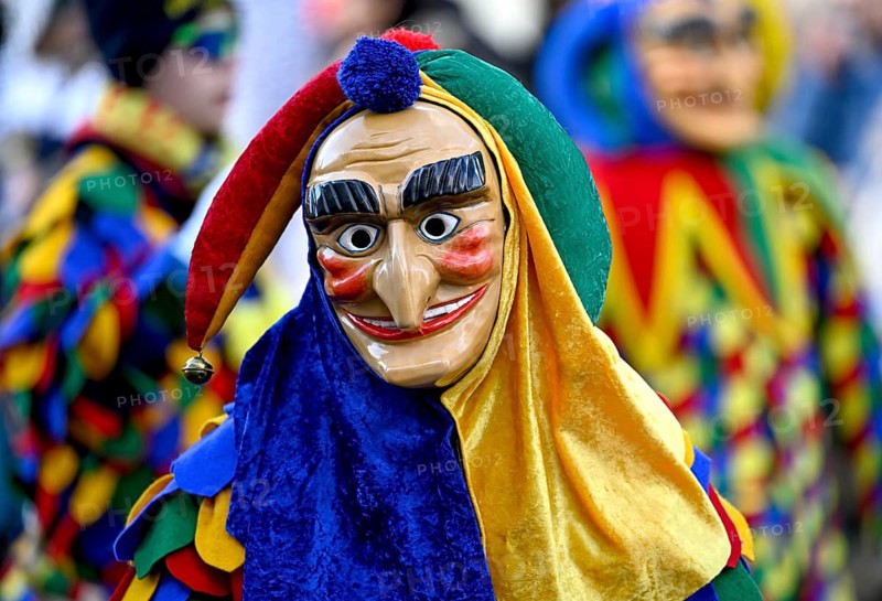 Member of a fools' guild in traditional Haes, fools' clothes, during the carnival procession in Achern, Ortenaukreis, Baden-Württemberg, Germany