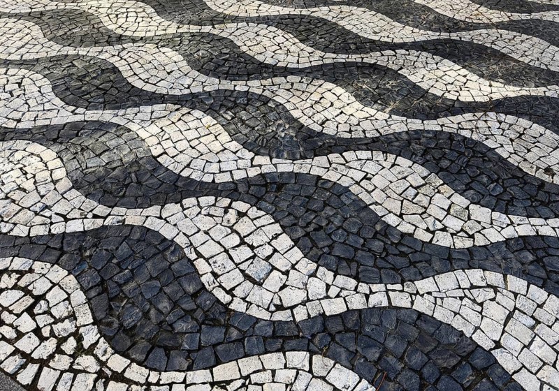 Black and white paving, Calçada Portugesa, traditional limestone and basalt mosaic paving, identity-creating cultural heritage, Porto, Portugal