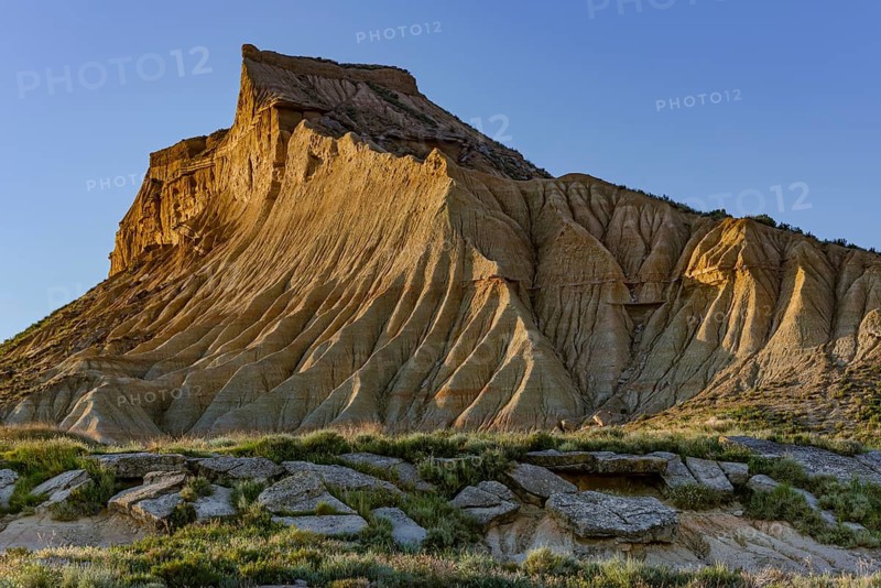 Bizarre rock formation in evening light in Bardenas Reales nature park Park, Navarra, Spain