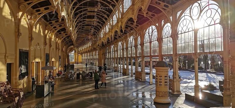 Elegant historic arcades with presentable lighting and retro atmosphere in the sunshine, Maxim Gorky Kollonade, Marianske Lazne main colonade, Marianske Lazne, Czech Republic