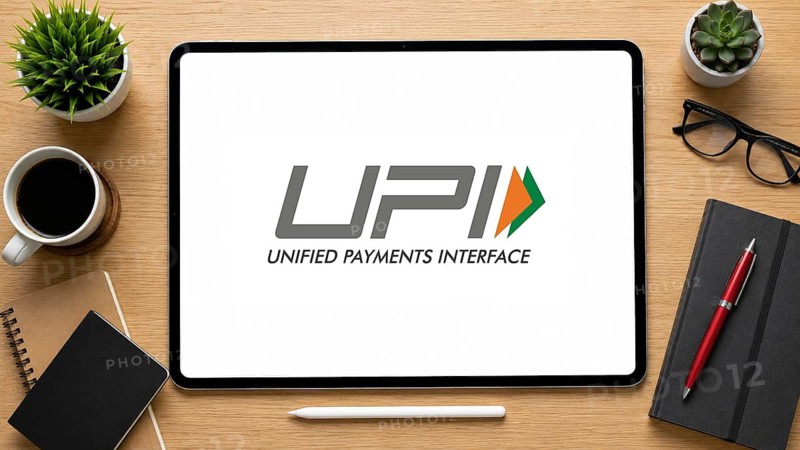 In this photo illustration, an iPad displays the UPI logo on a minimalist wooden office desk, in Delhi, India on 14 August 2026