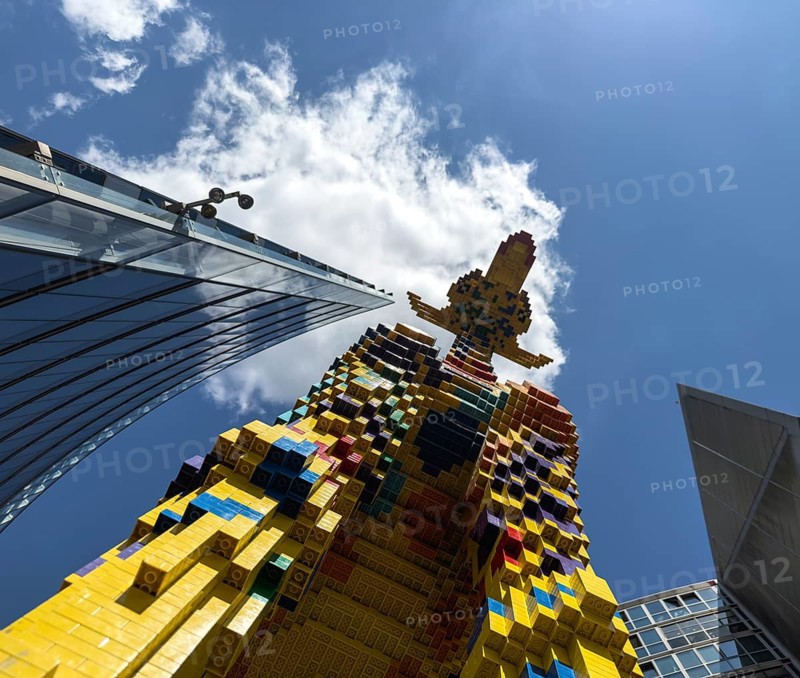Frog's eye view, The Lego giraffe in front of LEGOLAND at Potsdamer Platz, Berlin, Germany