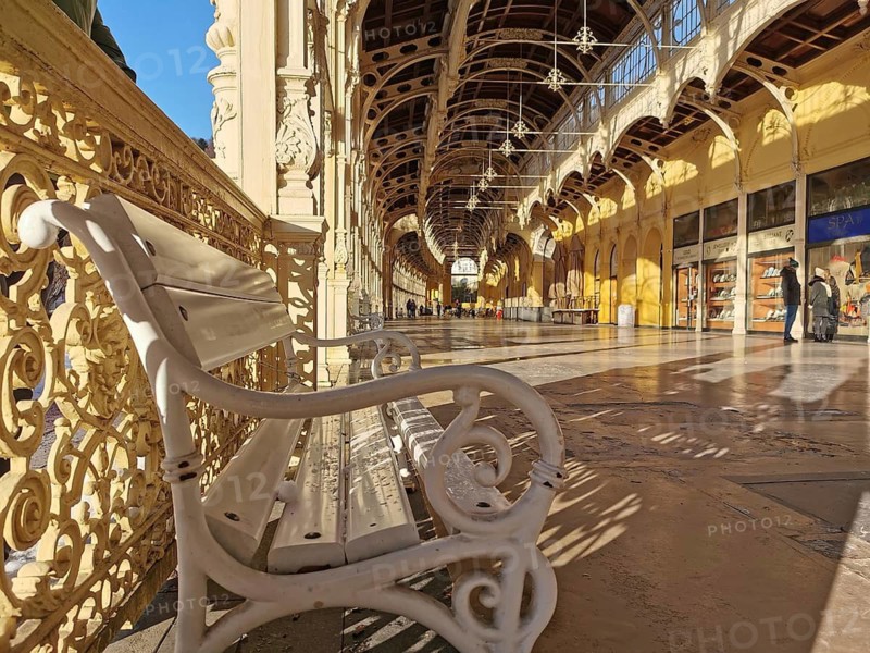 Curved benches and decorated corridor in historic architectural design, Maxim Gorki Kollonade, Marianske Lazne main colonade, Marianske Lazne, Czech Republic
