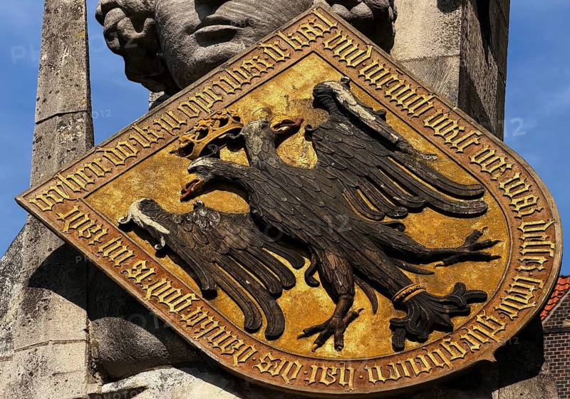 The shield of Roland of Bremen with the imperial eagle of the Holy Roman Empire and the translated text Freiheit ich euch offenbar, which Karl and many princes, indeed, gave to this place, whose thanks God, that is my advice, Bremen, Germany