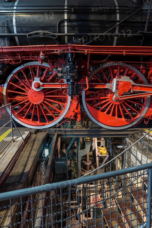 Detailed view of a steam locomotive over a repair pit in the former depot, German Steam Locomotive Museum, Neuenmarkt, Upper Franconia, Bavaria, Germany
