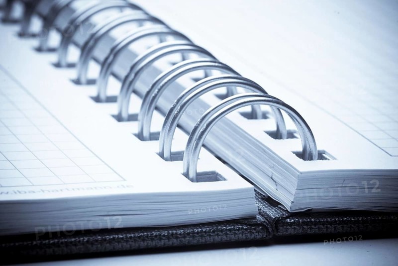 A blank checkered notebook, notes