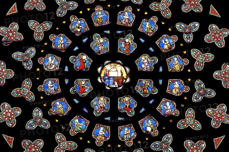 Circular glass rosette with ornate stained glass representations, Saint-Paul-Aurélien Cathedral in Saint-Pol-de-Léon, Brittany
