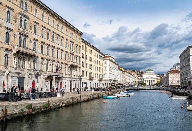 Grand Canal with restaurants and boats, Sant'Antonio Taumaturgo church in the back, Borgo Teresiano, Trieste, Friuli-Venezia Giulia region, Italy