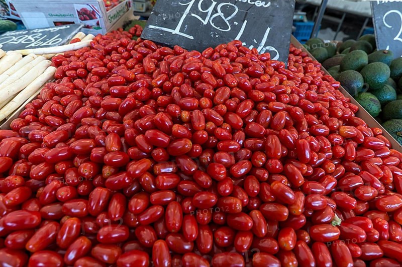 Egg-shaped tomatoes (Solanum lycopersicum) at a weekly market market, the Netherlands