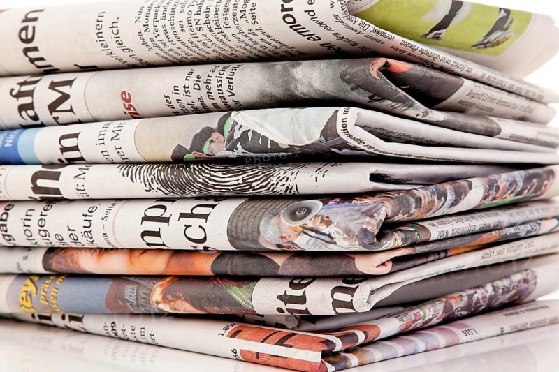 Old newspapers and magazines in a pile, stacks of newspapers, waste paper, recycling, recyclable material