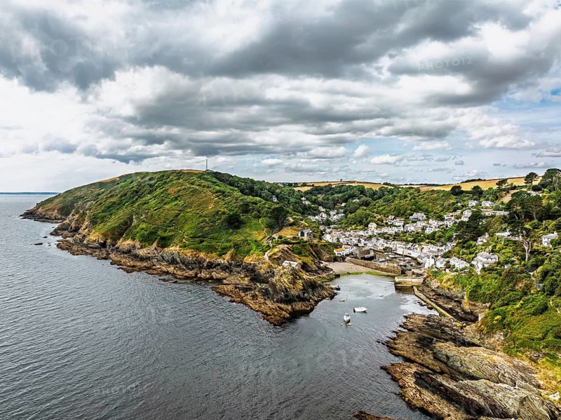 Polperro Harbour and Village from a drone, Polperro, Looe, Cornwall, England, United Kingdom