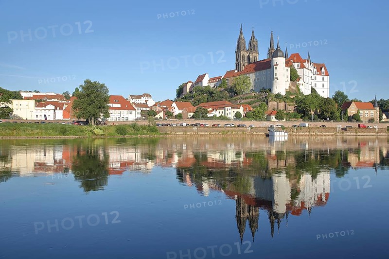 Cityscape with old town bridge, castle hill with Albrechtsburg and cathedral, reflection in the river Elbe, Meissen, Saxony, Germany