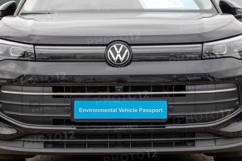 (Photo montage) New VW with the inscription ENVIRONMENTAL VEHICLE PASSPORT on the license plate holder