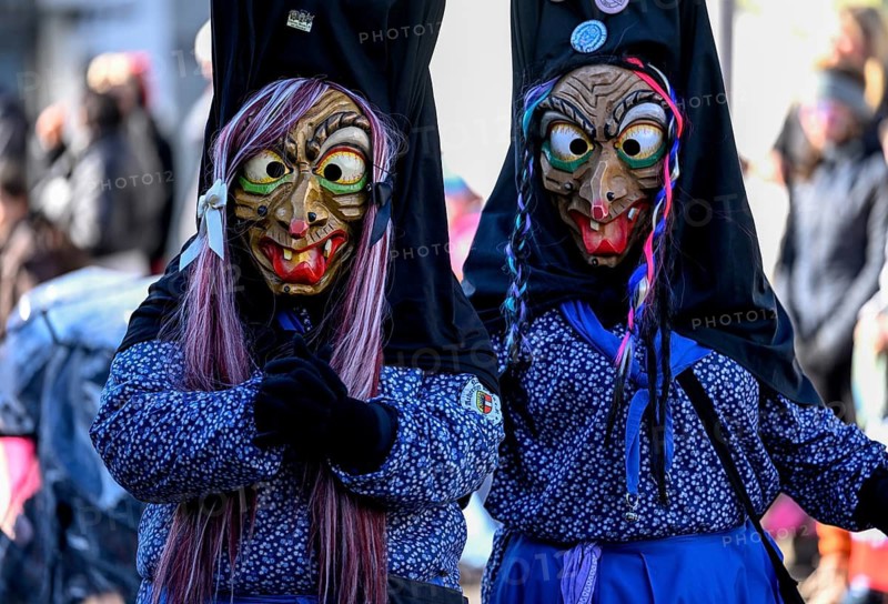 Members of a fools' guild in traditional Haes, fools' clothes, during the carnival procession in Achern, Ortenaukreis, Baden-Württemberg, Germany
