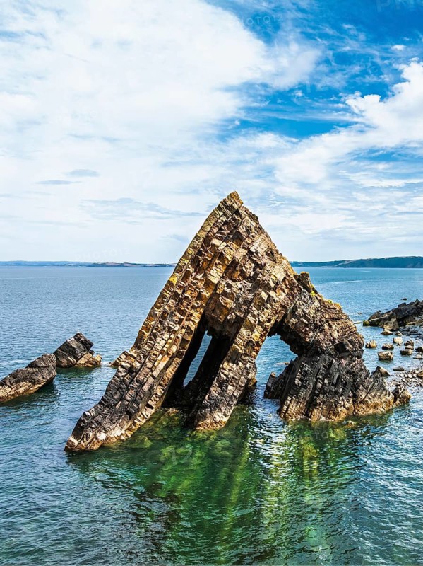 Blackchurch Rock and Cliffs over Mouthmill Beach from a drone, North Devon Coast, Devon, England, United Kingdom