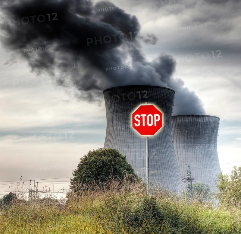 A photography of a nuclear power plant with a stop sign, Vienna, Austria
