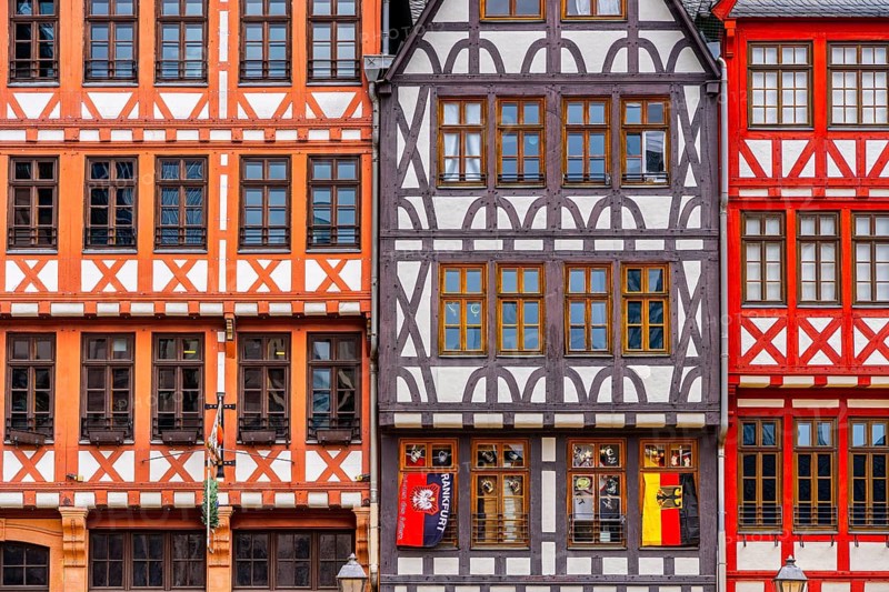 Guild signs and half-timbered houses on the Römerberg in Frankfurt am Main, Hesse, Germany