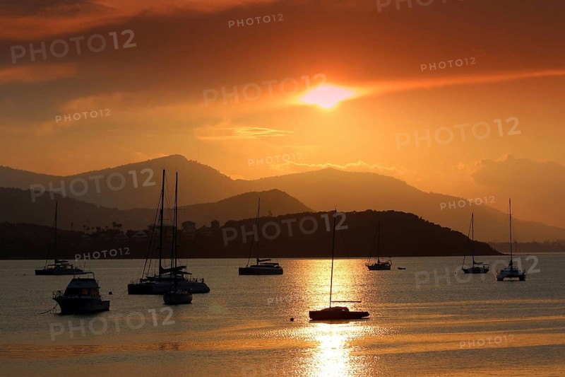 Boats in the evening light off Ko Samui, Kho Samui, Thailand. asia